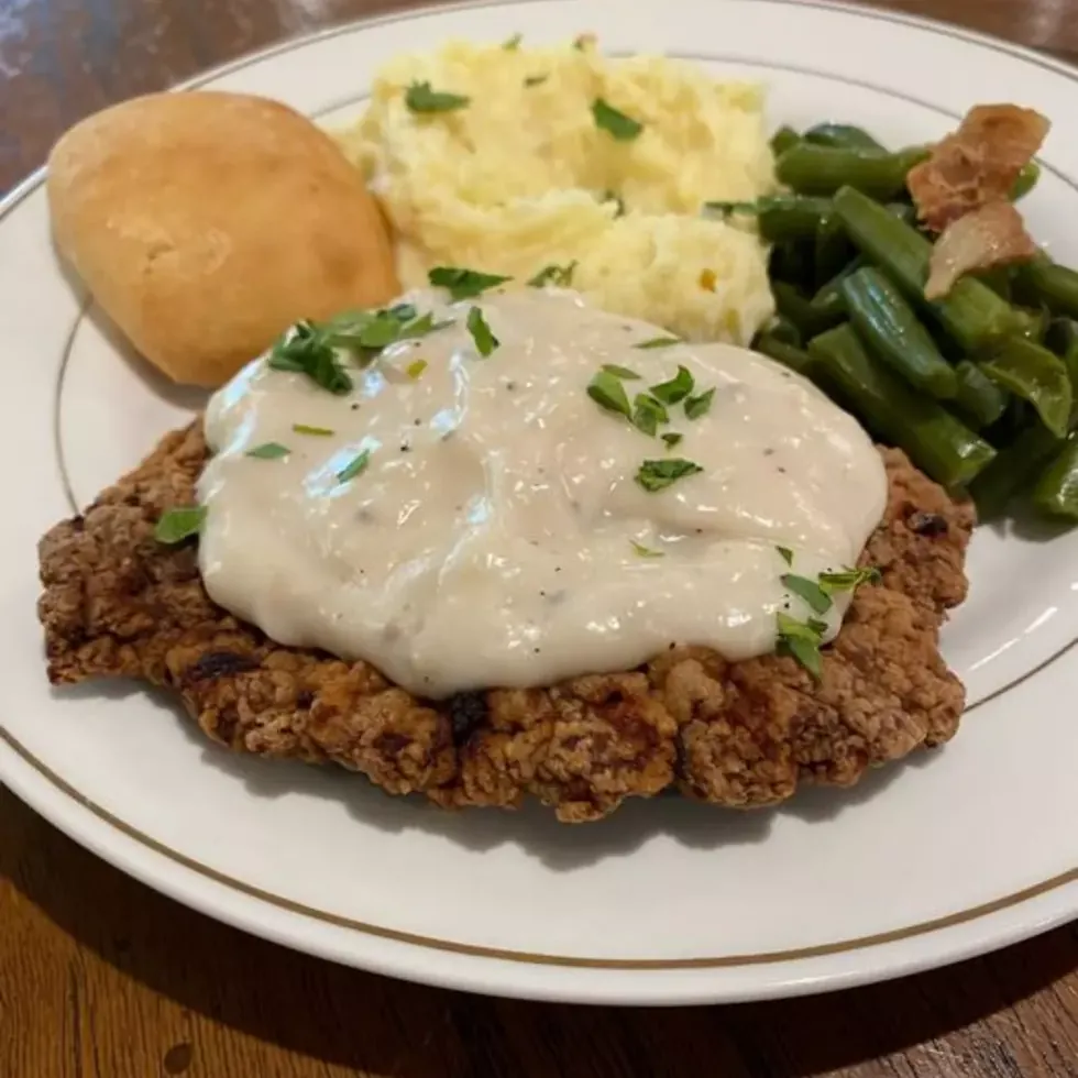 Chicken fried steak with cream gravy, mashed potatoes, green beans and a roll at Rice's Café