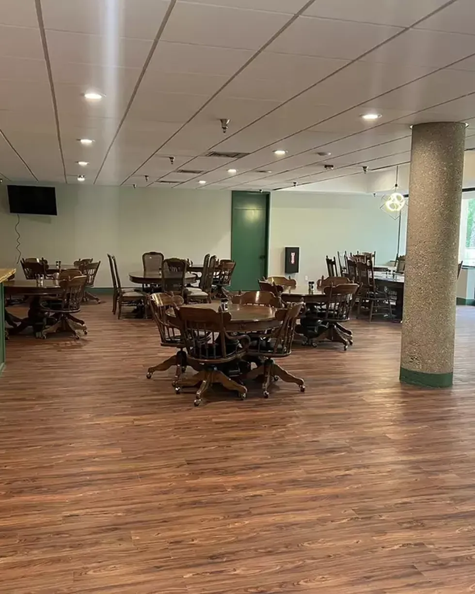 Bright, modern dining room at Rice's Café with wood tables and natural light